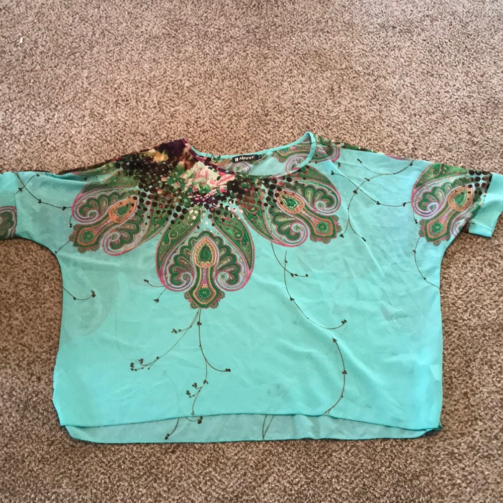 Blouse over shirt.